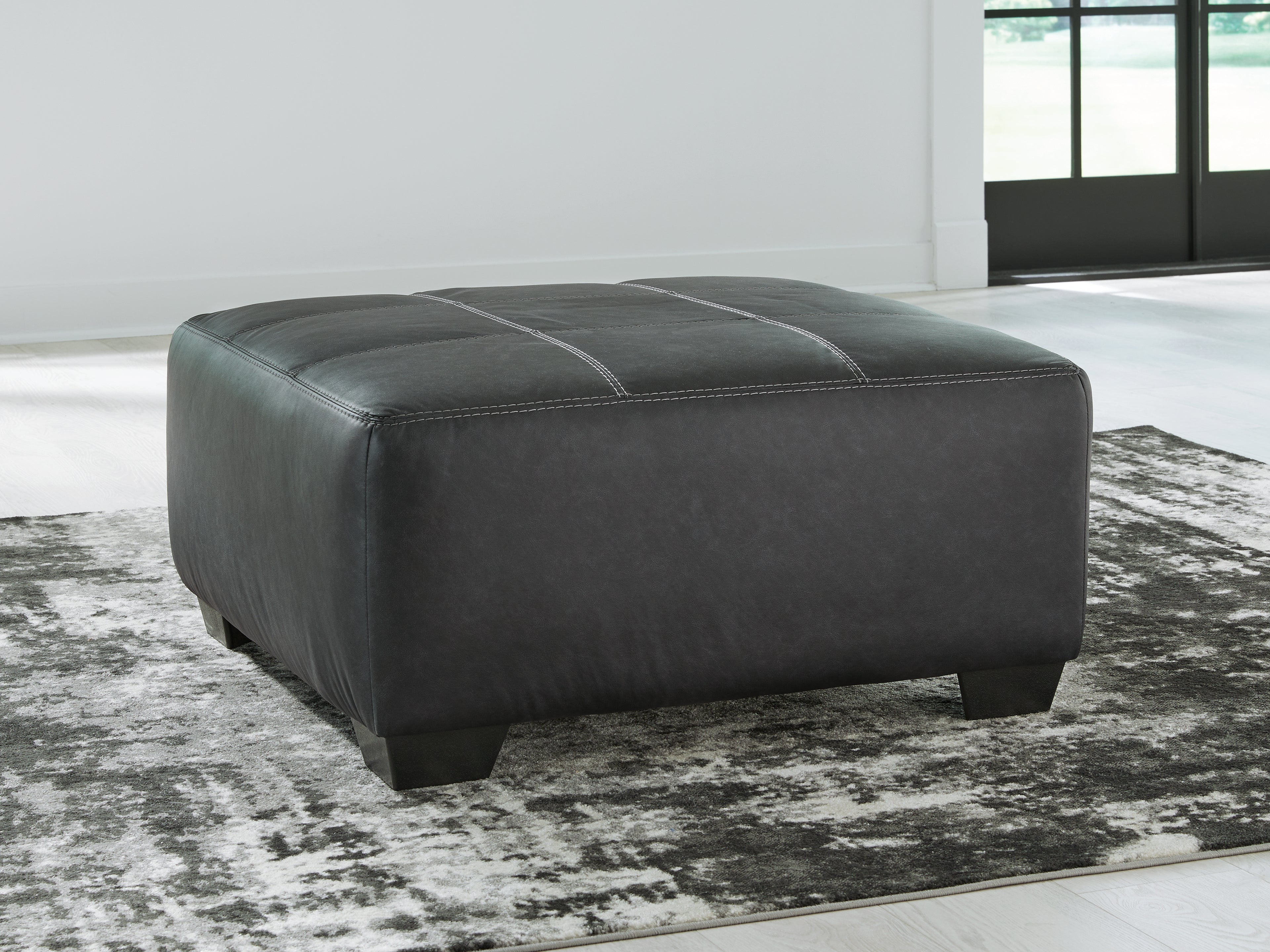 Bay Furniture Gallery - Ashley Furniture - Brixley Pier Living Room - Oversized Accent Ottoman / Graphite - 2990608