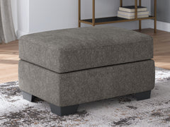 Bay Furniture Gallery - Ashley Furniture - Olten Living Room - Ottoman / Mocha - 3130414