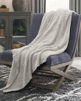 Bay Furniture Gallery - Ashley Furniture - Leonita Throw - Throw / Black/White - A1000769T