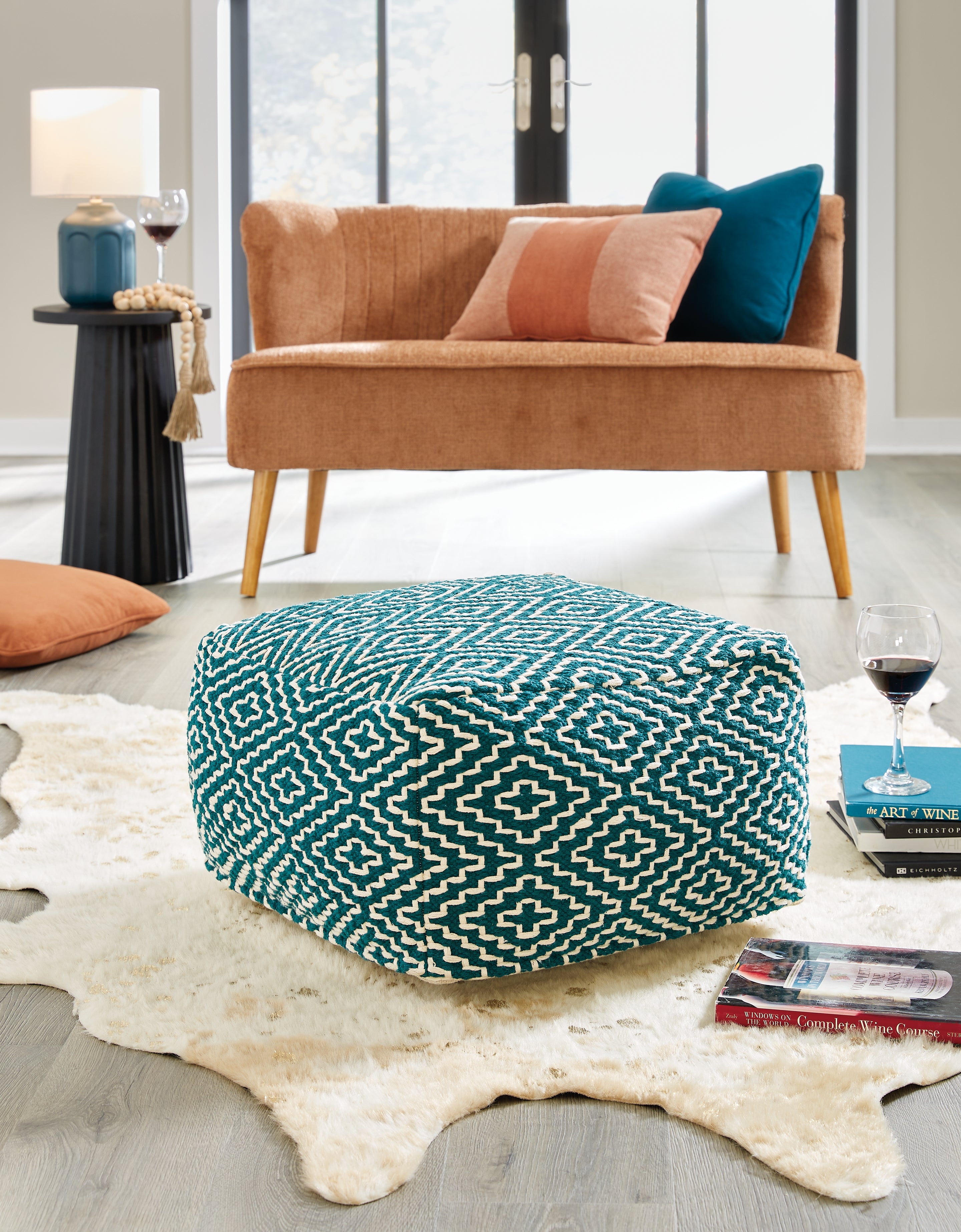 Bay Furniture Gallery - Ashley Furniture - Brynnsen Pouf - Pouf / Rust/Ivory - A1001056