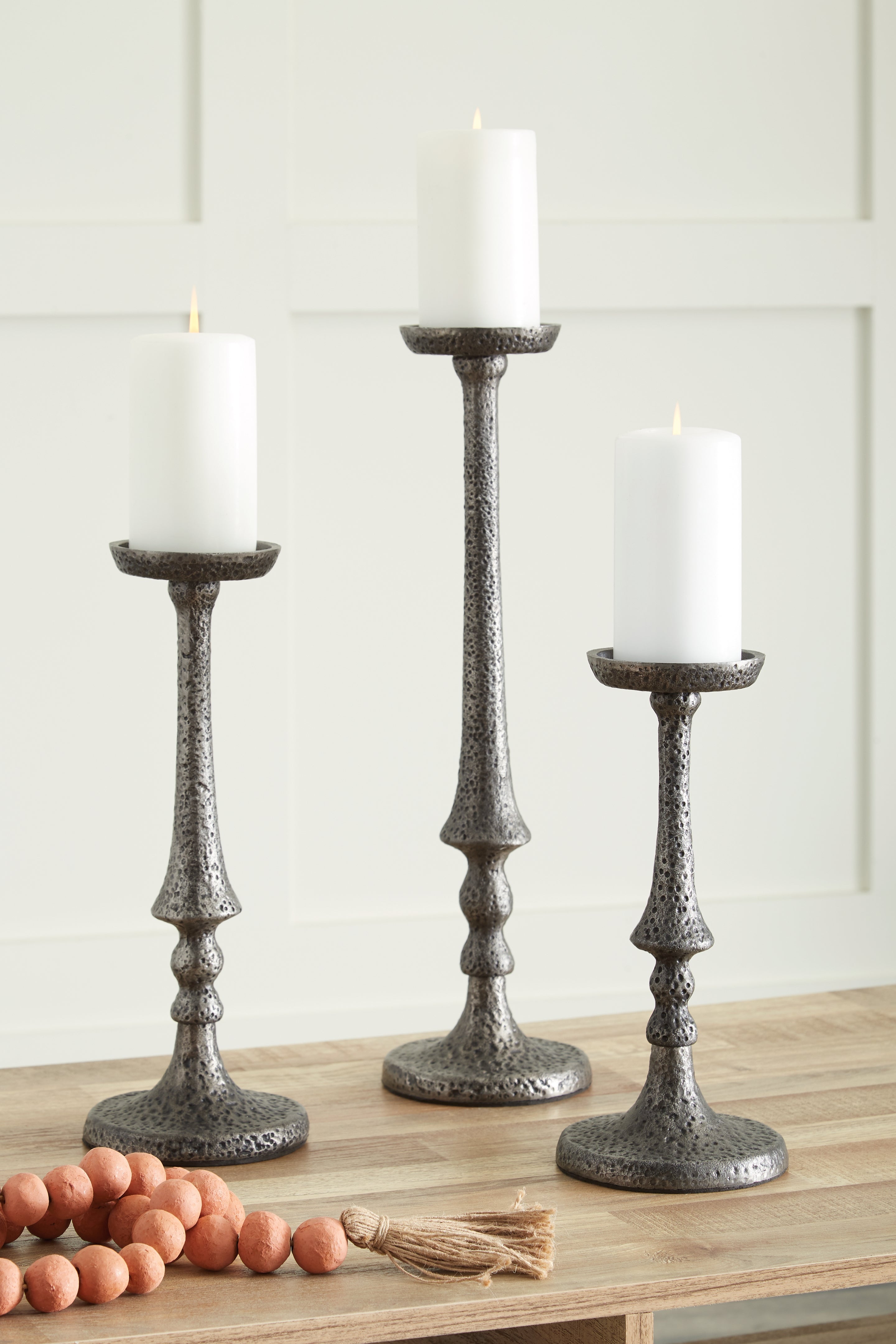Bay Furniture Gallery - Ashley Furniture - Eravell Candle Holder - Candle Holder Set (3/CN) / Pewter Finish - A2000584
