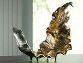 Bay Furniture Gallery - Ashley Furniture - Darinsen Sculpture - Sculpture / Gold/Silver Finish - A2000785