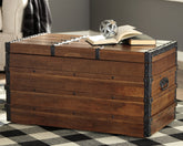 Bay Furniture Gallery - Ashley Furniture - Kettleby Storage Trunk - Storage Trunk / Brown - A4000096