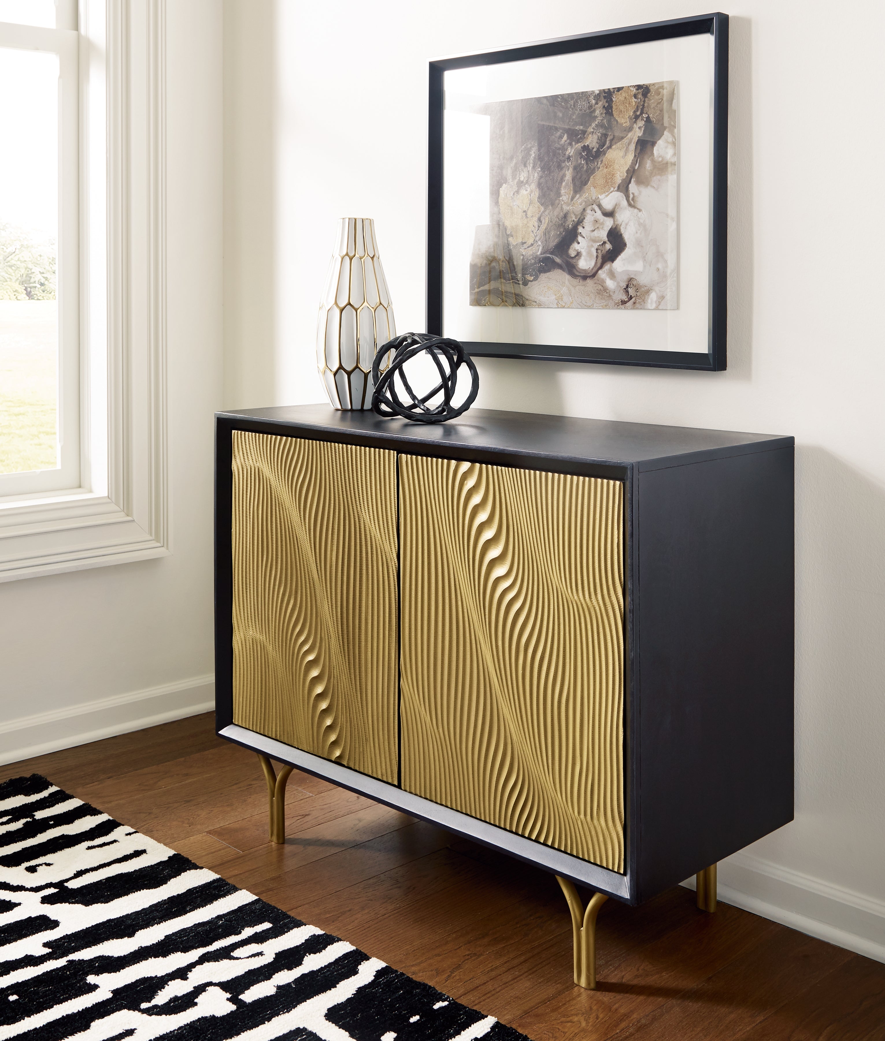 Bay Furniture Gallery - Ashley Furniture - Tayner Accent Cabinet - Accent Cabinet / Black/Gold Finish - A4000654