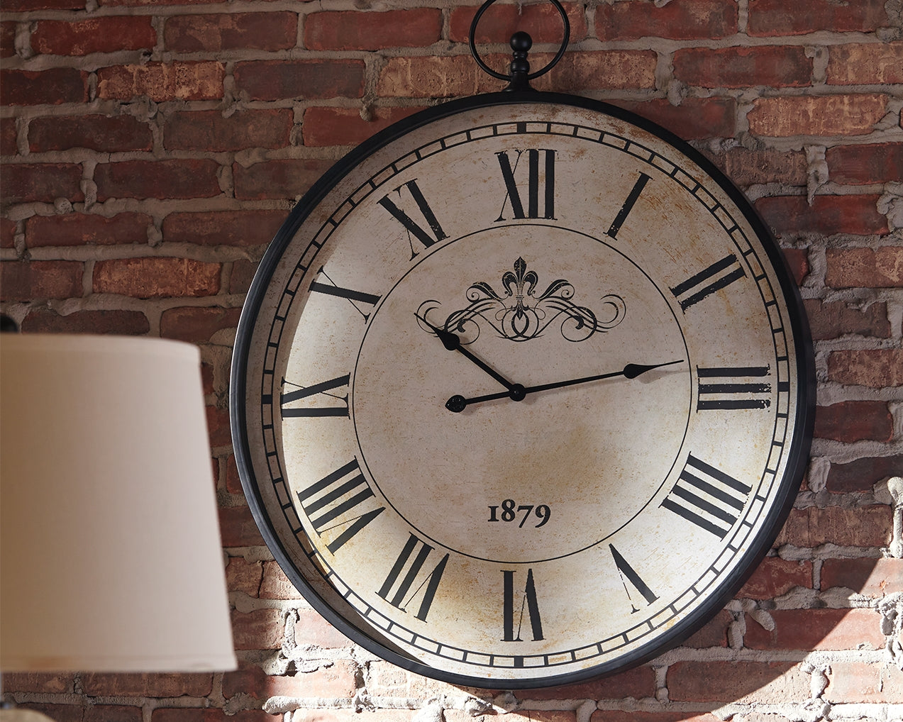 Bay Furniture Gallery - Ashley Furniture - Augustina Wall Decor - Wall Clock / Antique Black - A8010110