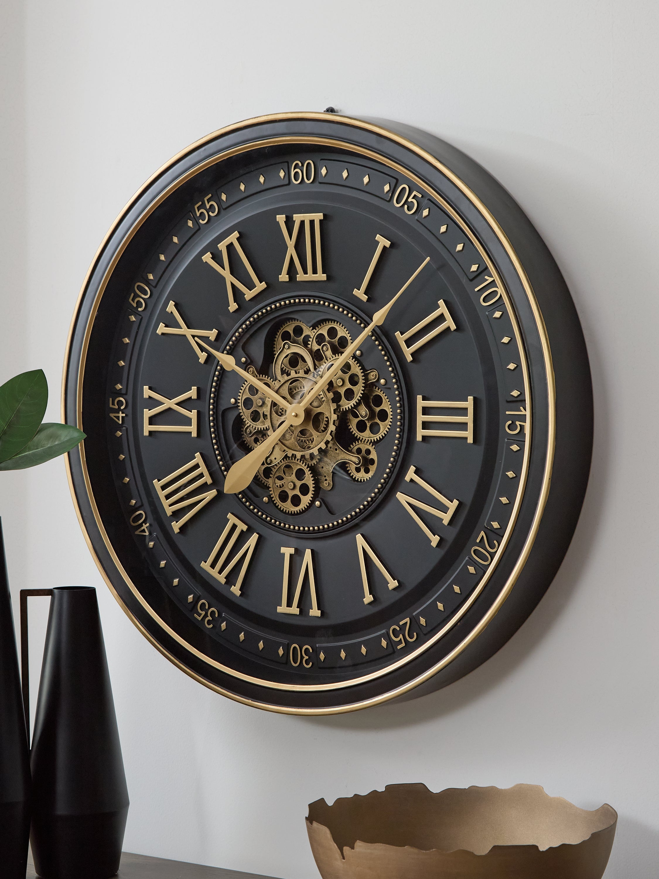 Bay Furniture Gallery - Ashley Furniture - Dairton Wall Decor - Wall Clock / Black/Gold Finish - A8010385