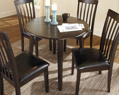 Bay Furniture Gallery - Ashley Furniture - Hammis Dining Room - Round DRM Drop Leaf Table / Dark Brown - D310-15