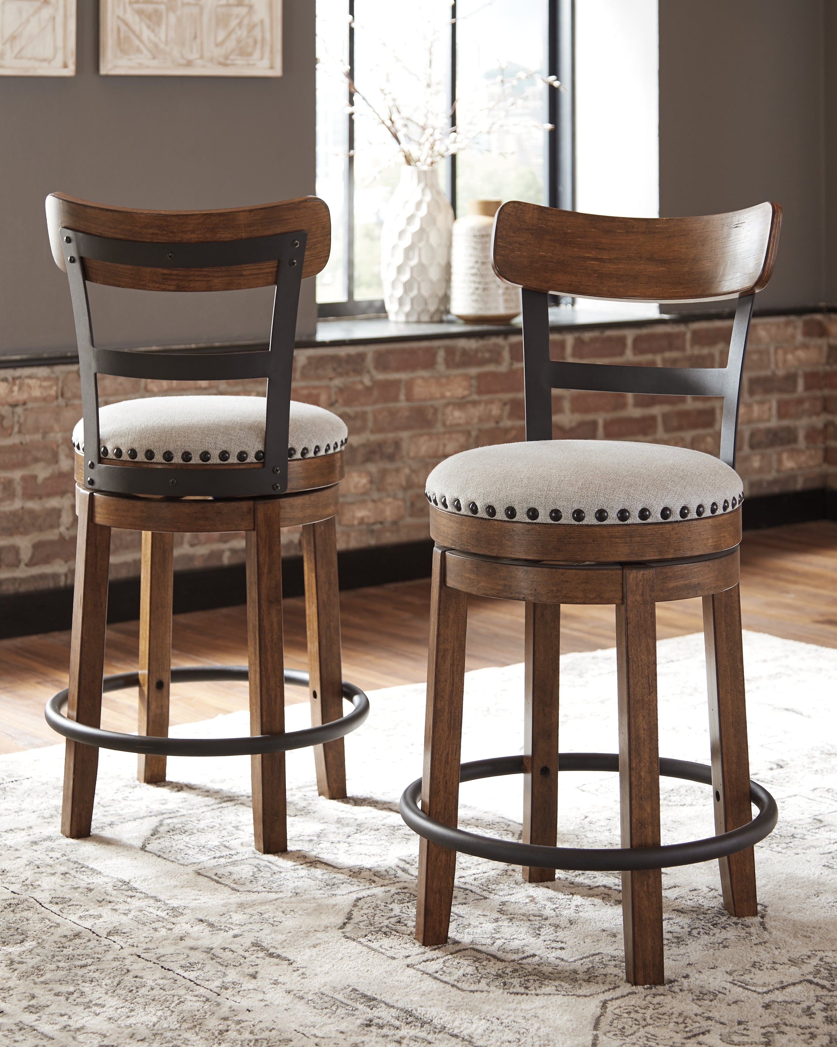 Bay Furniture Gallery - Ashley Furniture - Valebeck Dining Room - UPH Swivel Stool (1/CN) / Black - D546-824