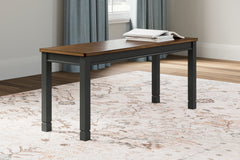 Bay Furniture Gallery - Ashley Furniture - Owingsville Dining Room - Large Dining Room Bench / Black/Brown / 42"W x 14"D x 18"H - D580-00