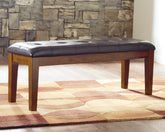 Bay Furniture Gallery - Ashley Furniture - Ralene Dining Bench - Large UPH Dining Room Bench / Medium Brown / 50"W x 16"D x 19"H - D594-00