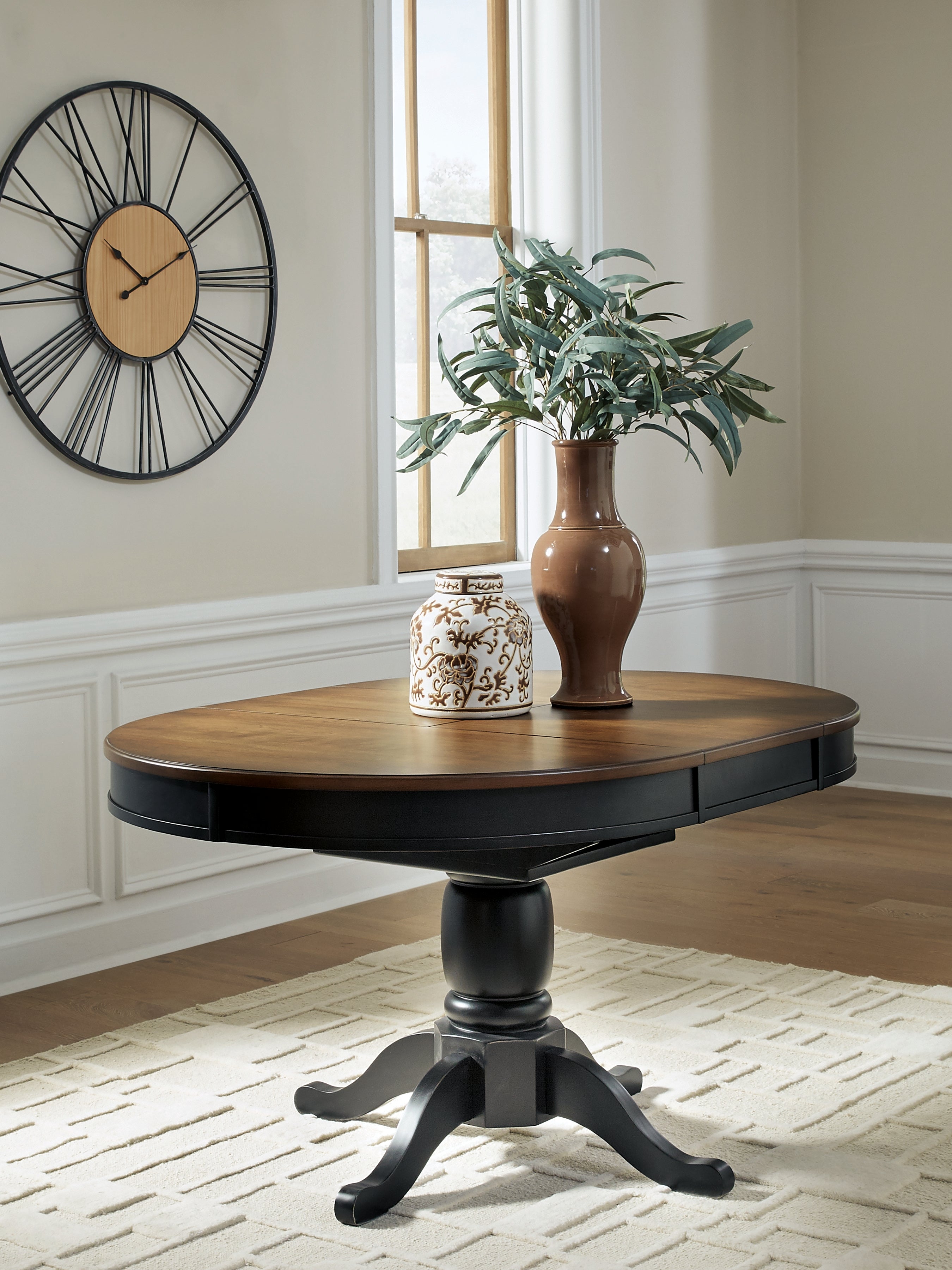 Bay Furniture Gallery - Ashley Furniture - Clorazi Dining Room - Oval DRM Butterfly EXT Table - PCD619-48