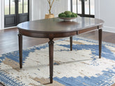 Bay Furniture Gallery - Ashley Furniture - Lavinton Dining Room - Oval Dining Room EXT Table / Brown - D764-35