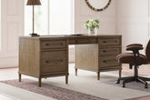Bay Furniture Gallery - Ashley Furniture - Roanhowe Office Desk - Home Office Desk / Brown - H769-21
