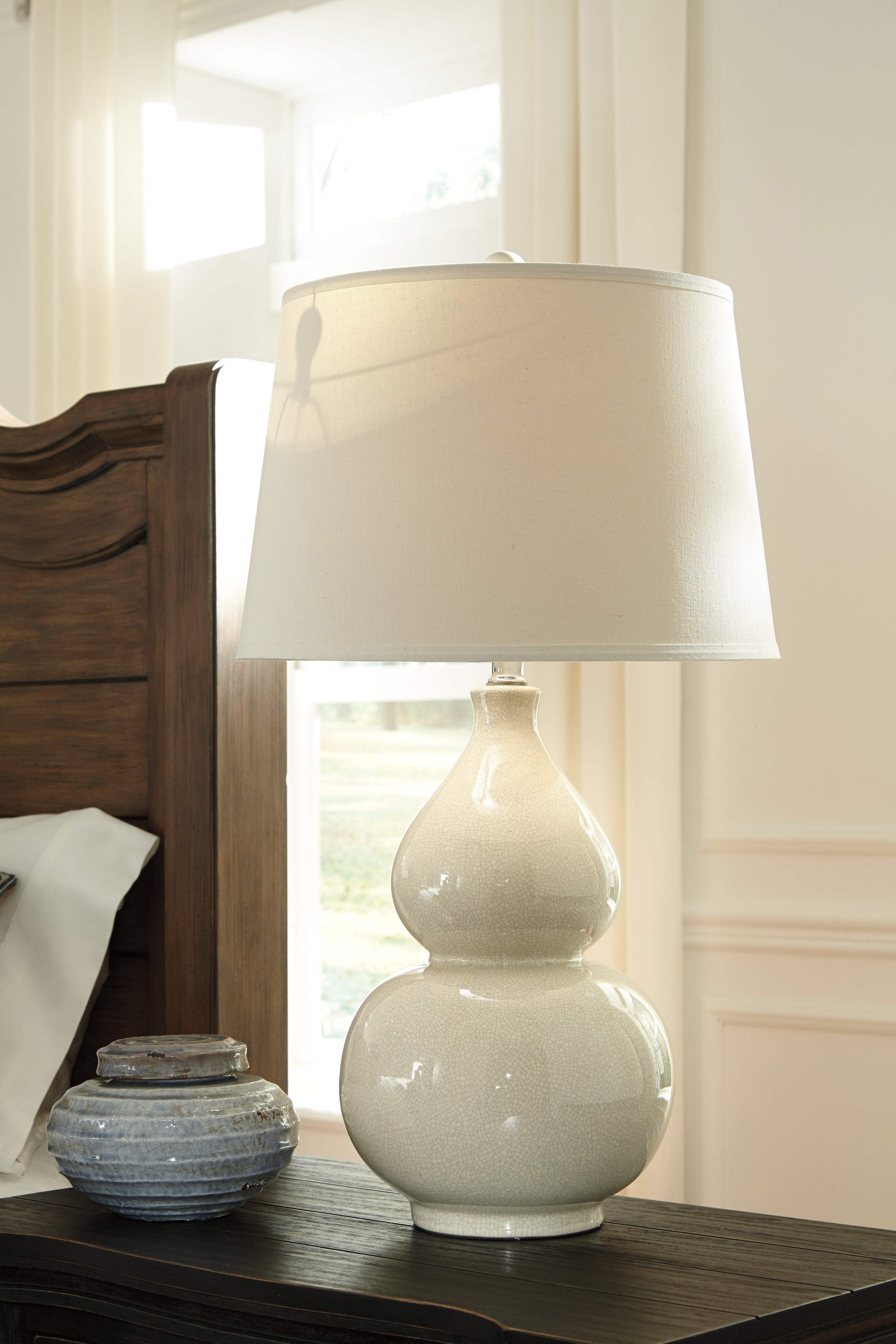 Bay Furniture Gallery - Ashley Furniture - Saffi Lighting - Ceramic Table Lamp (1/CN) / Cream - L100074