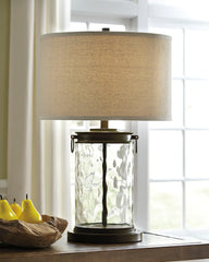 Bay Furniture Gallery - Ashley Furniture - Tailynn Lighting - Glass Table Lamp (1/CN) / Clear/Bronze Finish - L430324