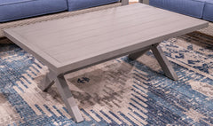 Bay Furniture Gallery - Ashley Furniture - Half Moon Beach Outdoor - Rectangular Cocktail Table / Gray - PCP418-701