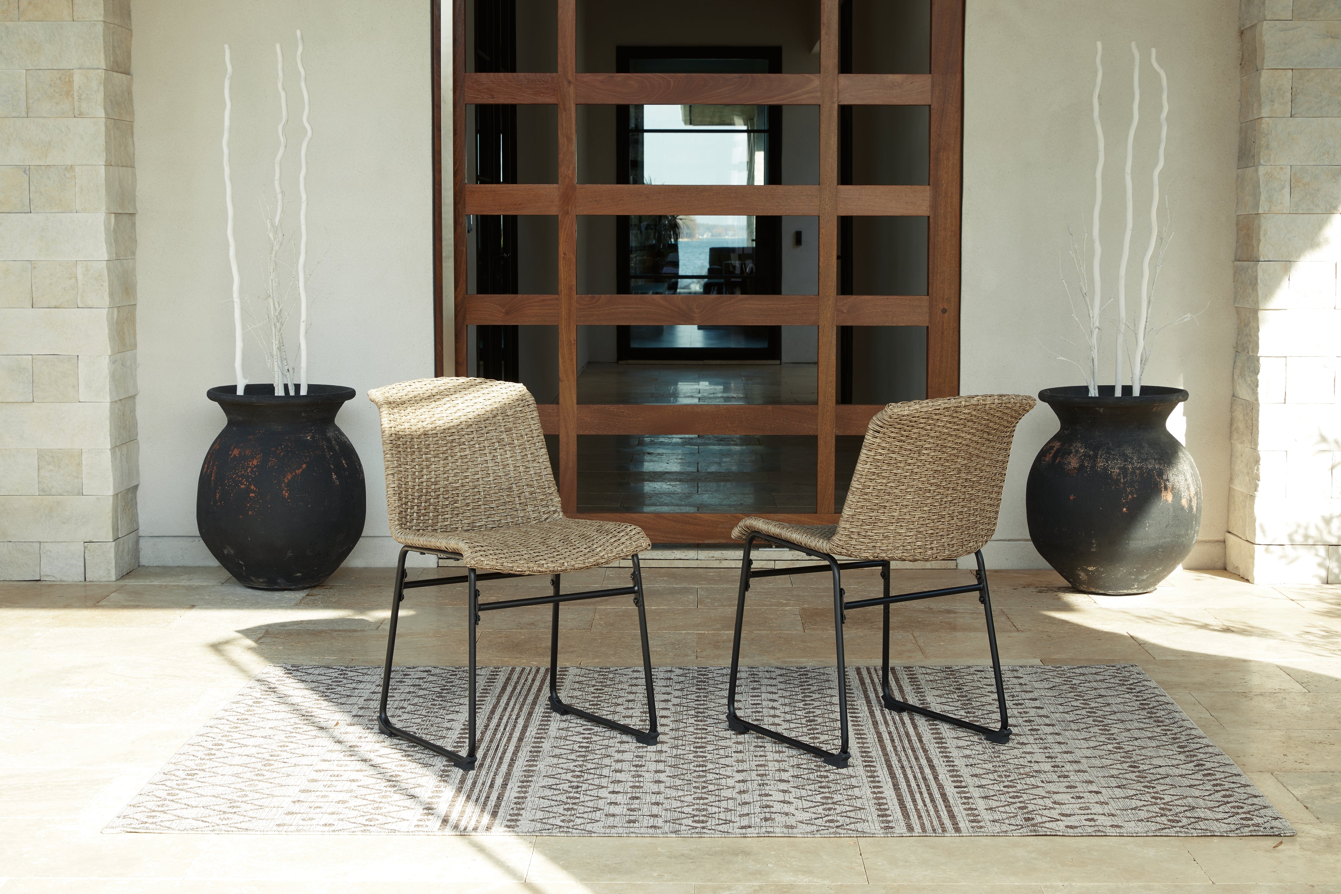 Bay Furniture Gallery - Ashley Furniture - Amaris Outdoor - Round Dining Table / Brown/Black - P369-615