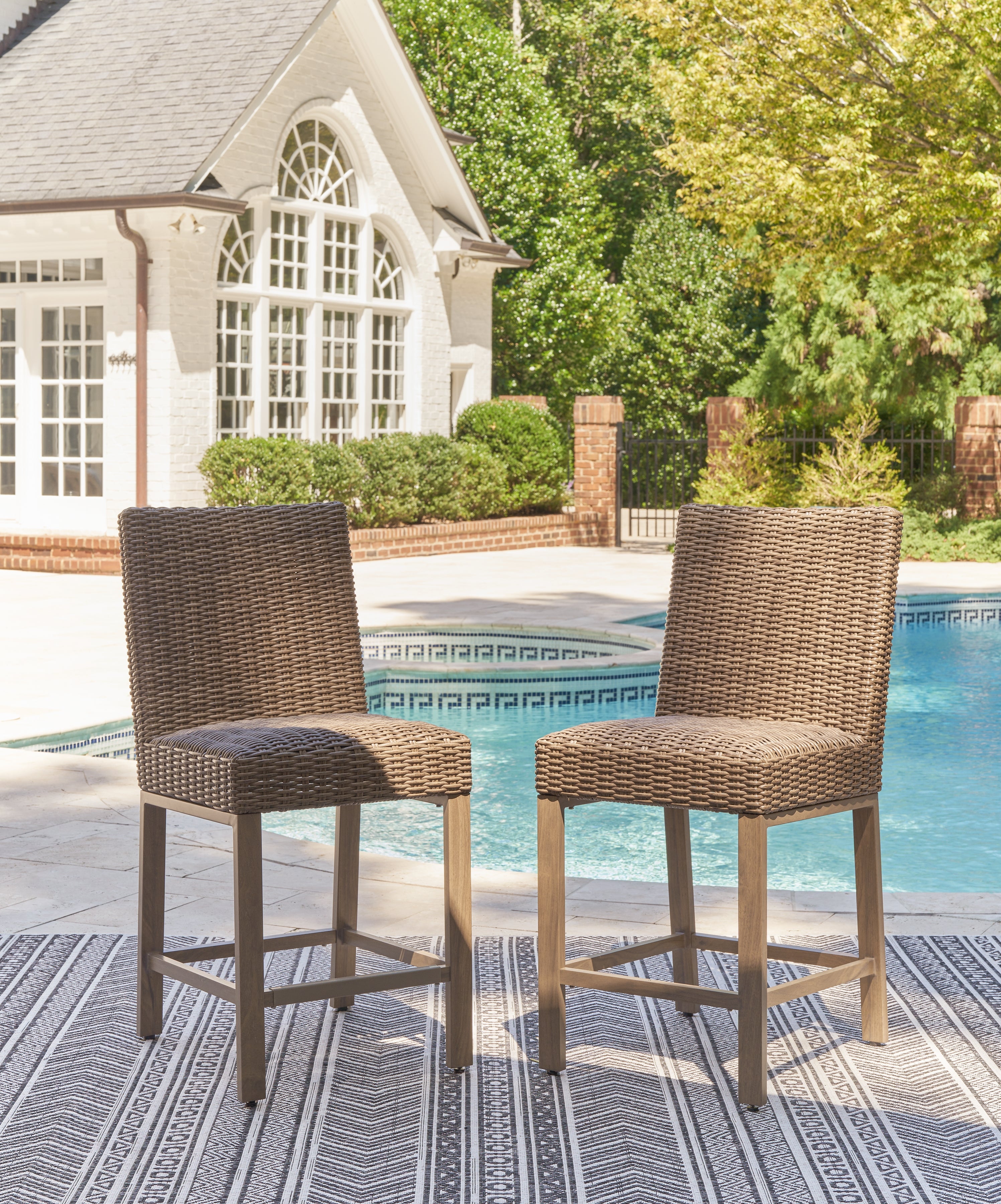 Bay Furniture Gallery - Ashley Furniture - Walton Bridge Outdoor - Barstool (Set of 2) / Driftwood - P749-130