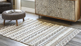 Bay Furniture Gallery - Ashley Furniture - Karalee Rug - 5' x 7' Rug / Ivory/Brown - R404442