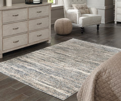 Bay Furniture Gallery - Ashley Furniture - Gizela Rug - 5'3" x 7'3" Rug / Ivory/Beige/Gray - R404862