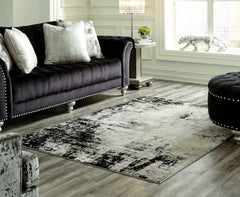 Bay Furniture Gallery - Ashley Furniture - Zekeman Rug - 7'10" x 10' Rug / Black/Cream/Gray - R404921
