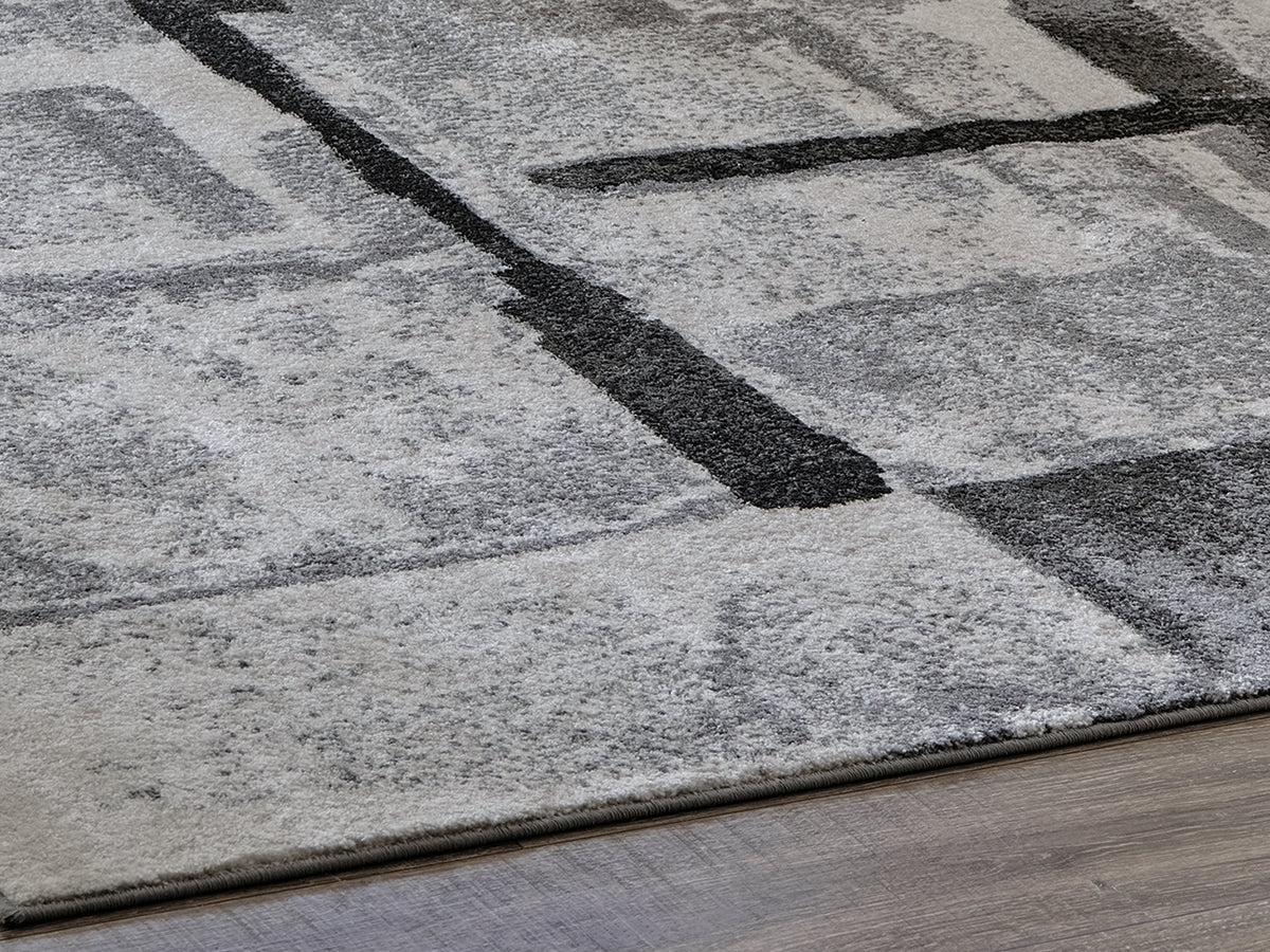 Bay Furniture Gallery - Ashley Furniture - Brycebourne Rug - 5'3" x 7'7" Rug / Black/Cream/Gray - R404982