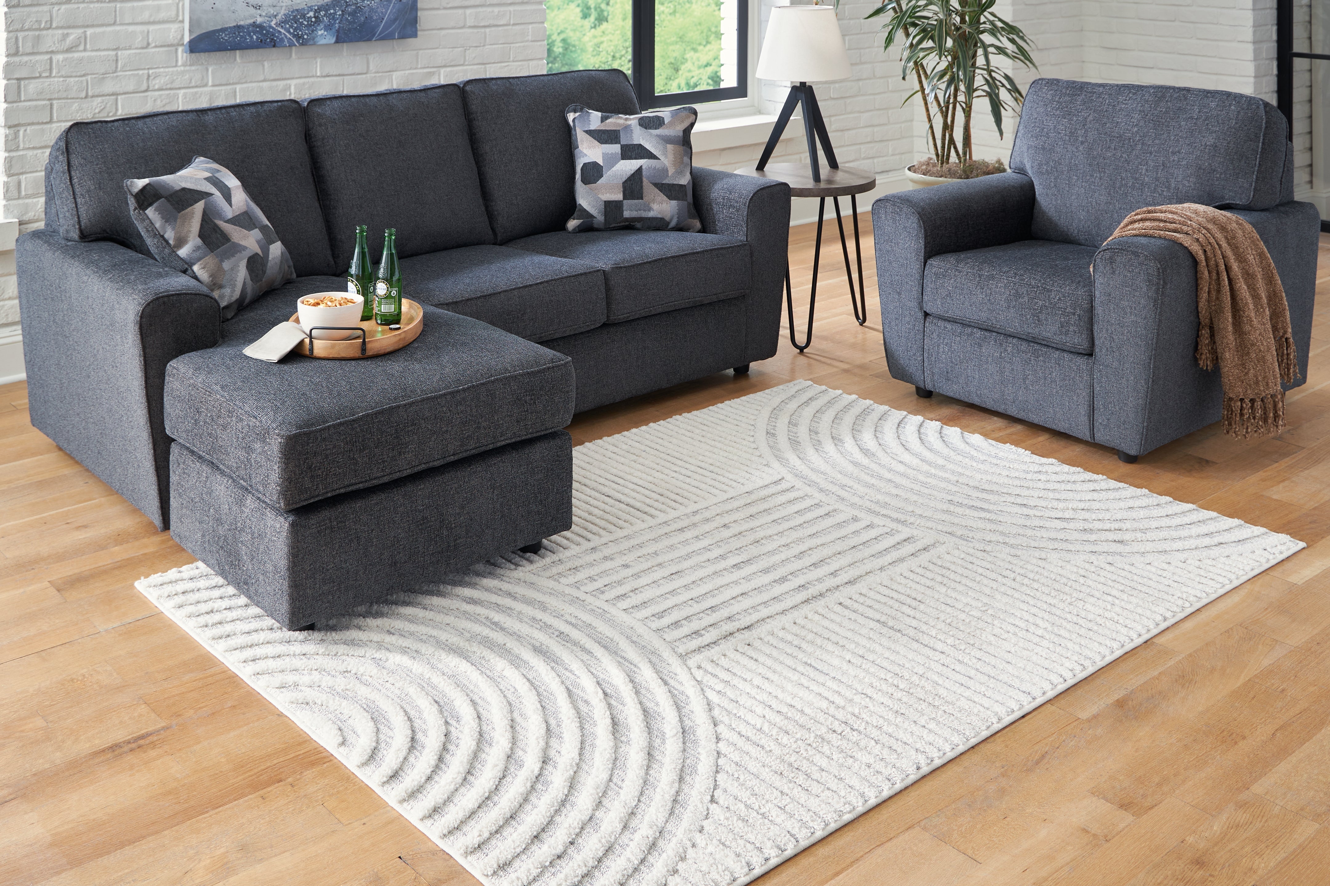 Bay Furniture Gallery - Ashley Furniture - Lambworth Rug - 7'10" x 10' Rug / Gray/Cream - R405341