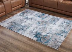Bay Furniture Gallery - Ashley Furniture - Garyard Rug - 5' x 7' Washable Rug / Multi - R405772