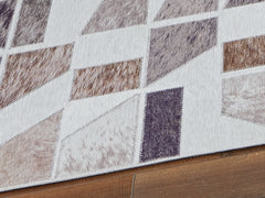 Bay Furniture Gallery - Ashley Furniture - Jettner Rug - 5' x 7' Rug / Multi - R405782