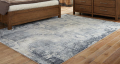Bay Furniture Gallery - Ashley Furniture - Langrich Rug - 7'10" x 10'6" Rug / Blue/Gray/Cream - R406131