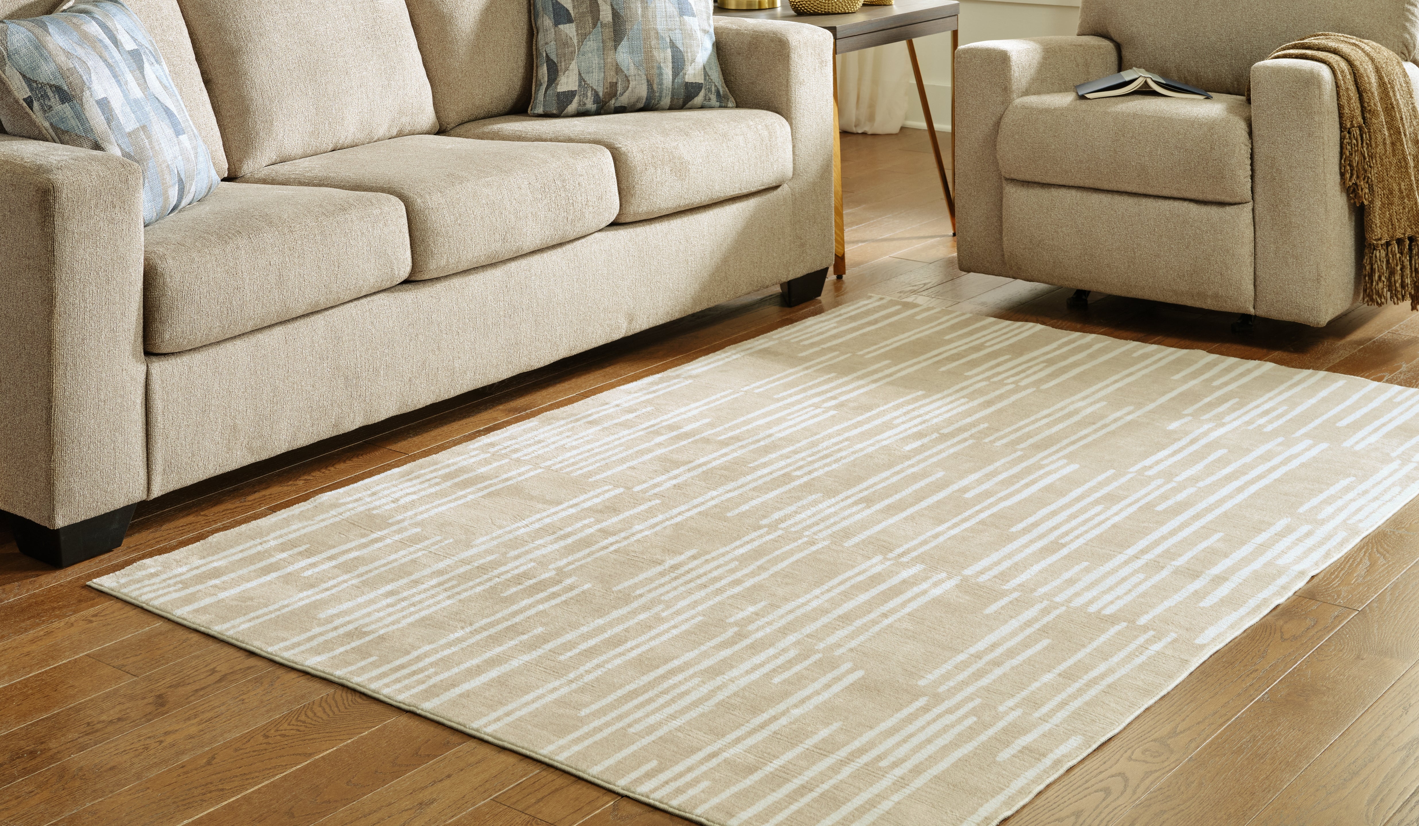 Bay Furniture Gallery - Ashley Furniture - Ardenville Rug - 5' x 7'1" Washable Rug / Tan/Cream - R406212