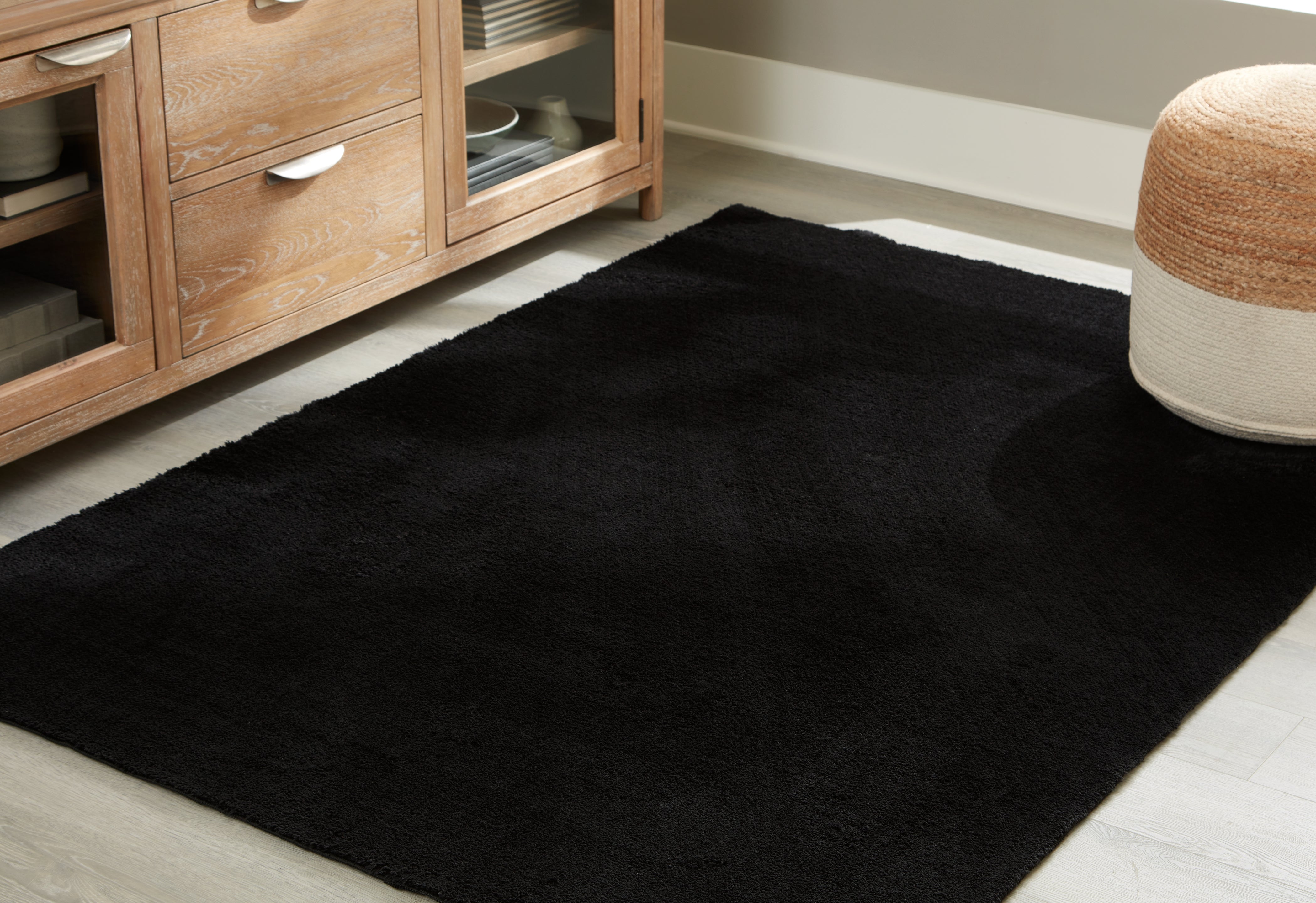 Bay Furniture Gallery - Ashley Furniture - Anaben Rug - 5' x 7' Washable Rug / Black - R406312