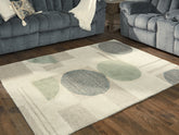 Bay Furniture Gallery - Ashley Furniture - Dallane Rug - 5' x 7' Rug / Linen/Blue/Green - R406352