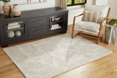 Bay Furniture Gallery - Ashley Furniture - Chadess Rug - 5' x 7' Rug / Linen/Taupe - R406362