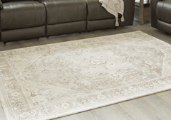 Bay Furniture Gallery - Ashley Furniture - Gatwell Rug - 5' x 7' Rug / Ivory/Gray/Tan - R406512