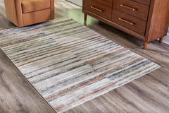 Bay Furniture Gallery - Ashley Furniture - Kemart Rug - 5' x 7' Rug / Multi - R406682