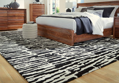 Bay Furniture Gallery - Ashley Furniture - Bramshaw Rug - 5' x 7' Rug / Black/Ivory - R406762