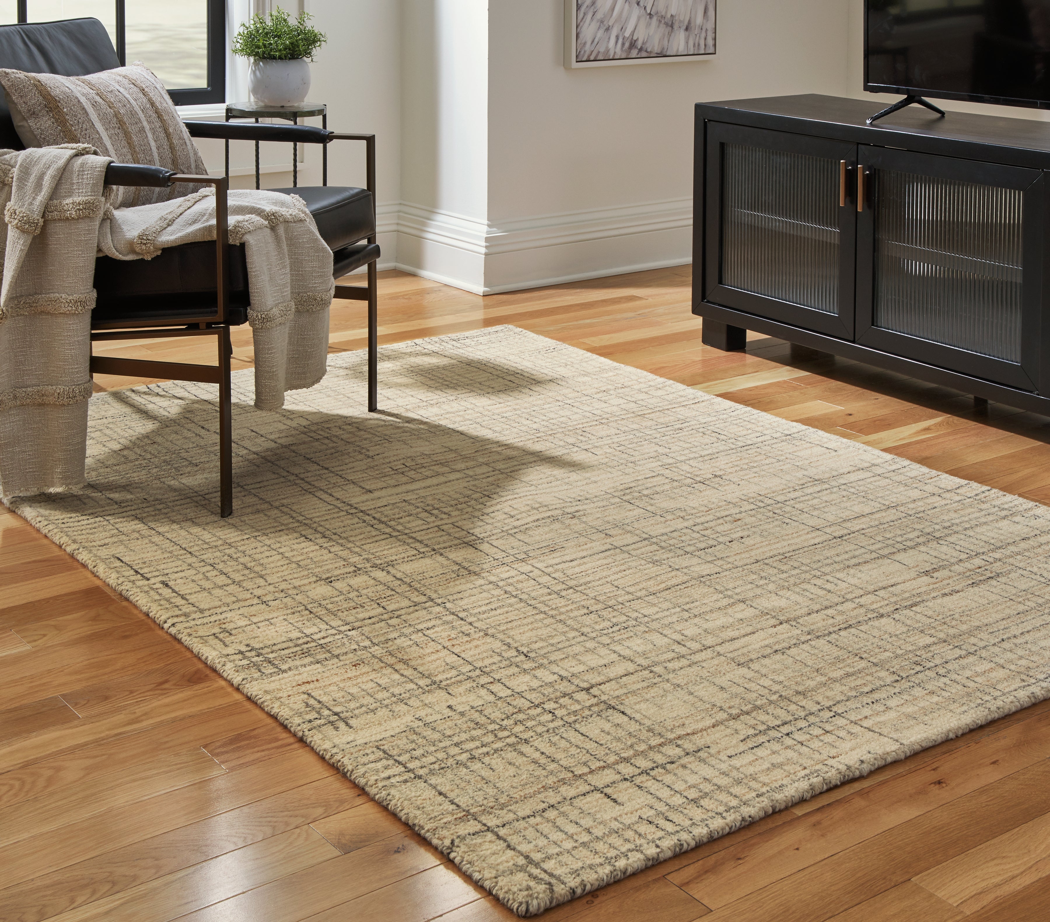 Bay Furniture Gallery - Ashley Furniture - Janston Rug - 5' x 7' Rug / Ivory/Gray/Tan - R406862
