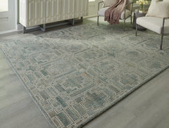 Bay Furniture Gallery - Ashley Furniture - Jossland Rug - 5' x 7' Rug / Green/Ivory - R406912
