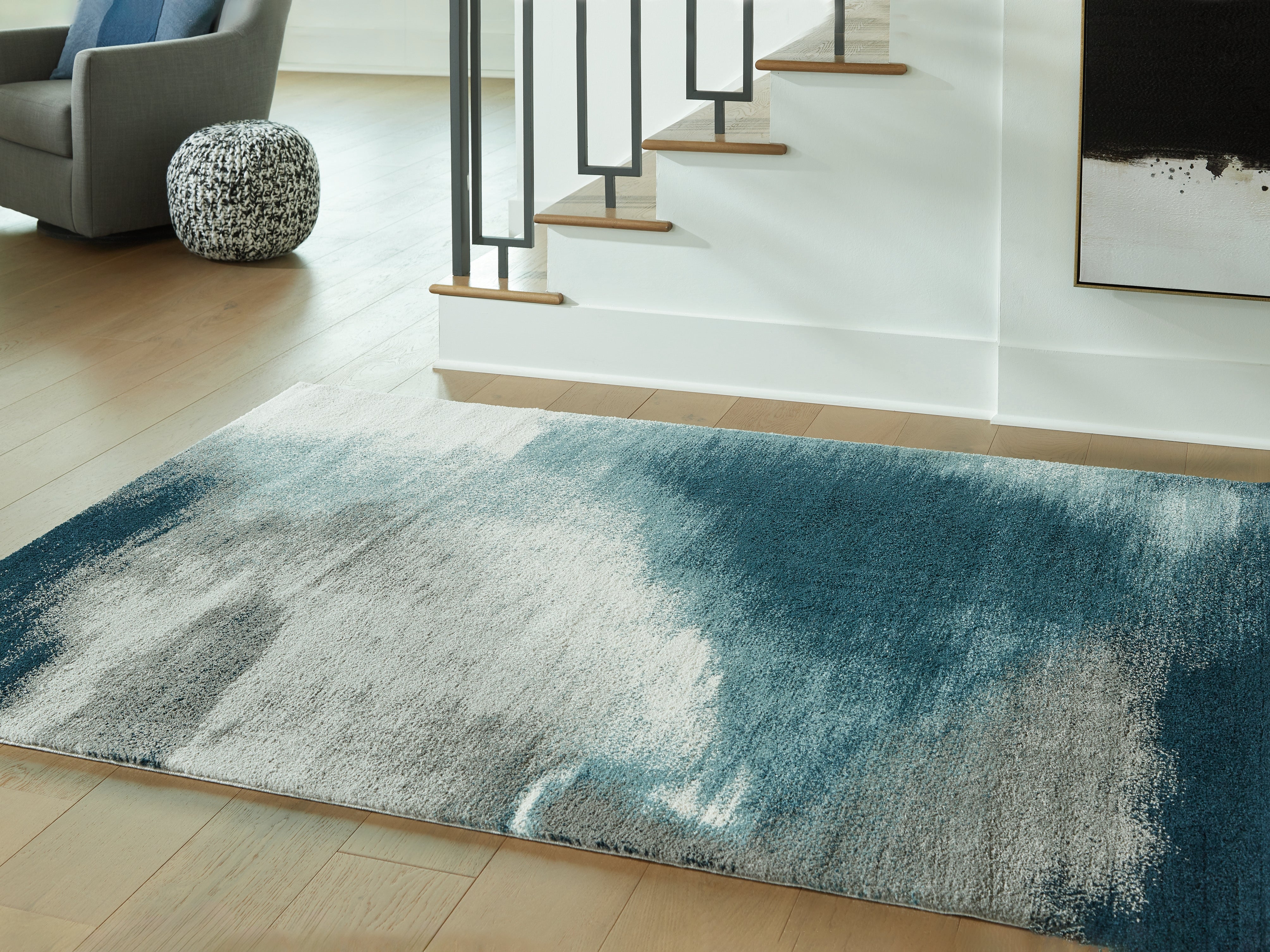 Bay Furniture Gallery - Ashley Furniture - Brentward Rug - 8' x 10' Rug / Blue/Gray/Ivory - R407081