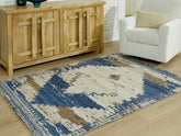 Bay Furniture Gallery - Ashley Furniture - Varnler Rug - 5' x 7' Rug / Blue/Brown/Tan - R407132