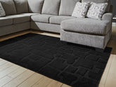 Bay Furniture Gallery - Ashley Furniture - Gibbswell Rug - Washable 5' x 7' Area Rug / Black - R407462