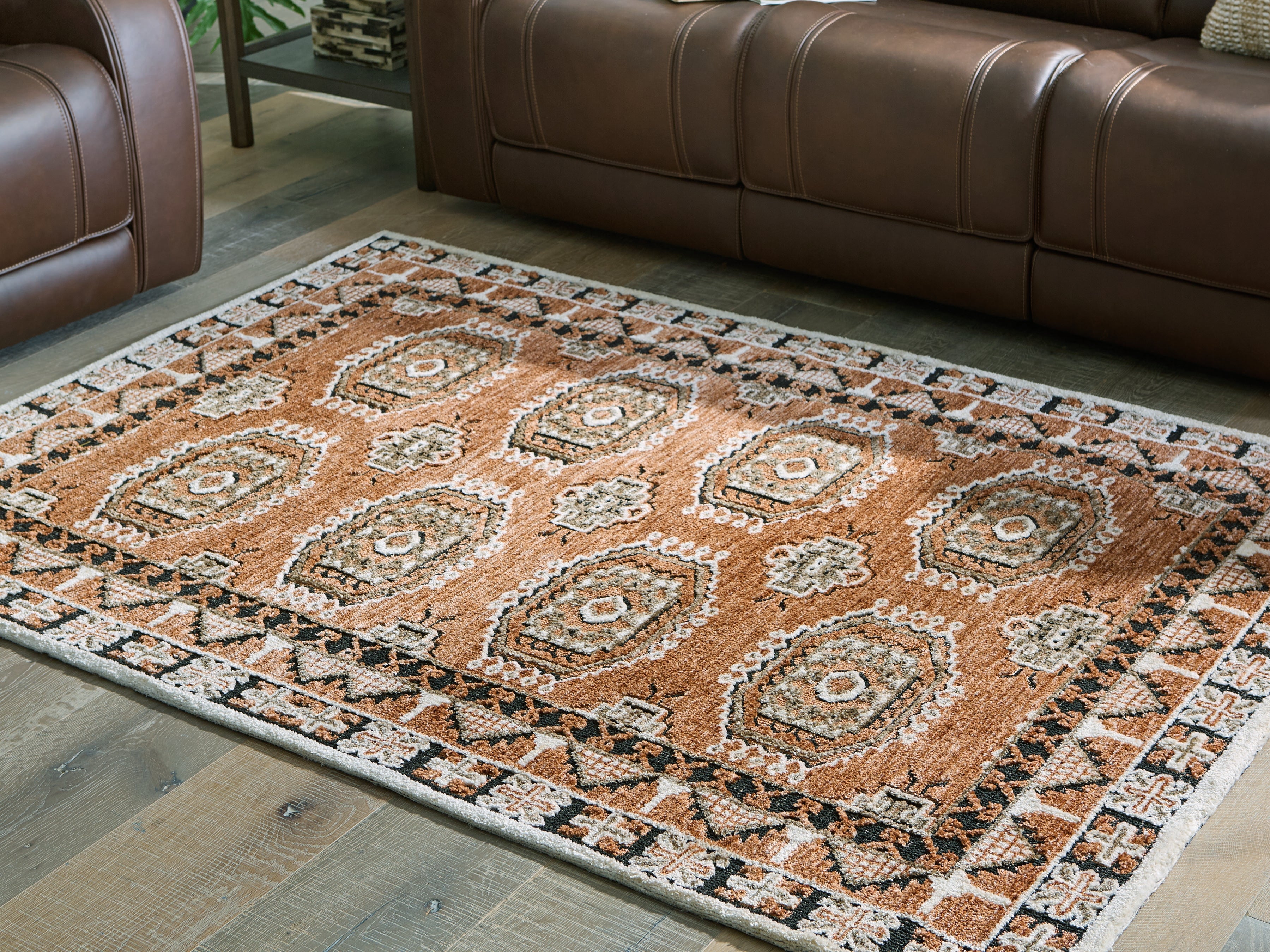 Bay Furniture Gallery - Ashley Furniture - Qaabiz Rug - 7'8" x 10' Area Rug / Sienna/Ivory/Black - R407521