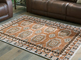 Bay Furniture Gallery - Ashley Furniture - Qaabiz Rug - 7'8" x 10' Area Rug / Sienna/Ivory/Black - R407521