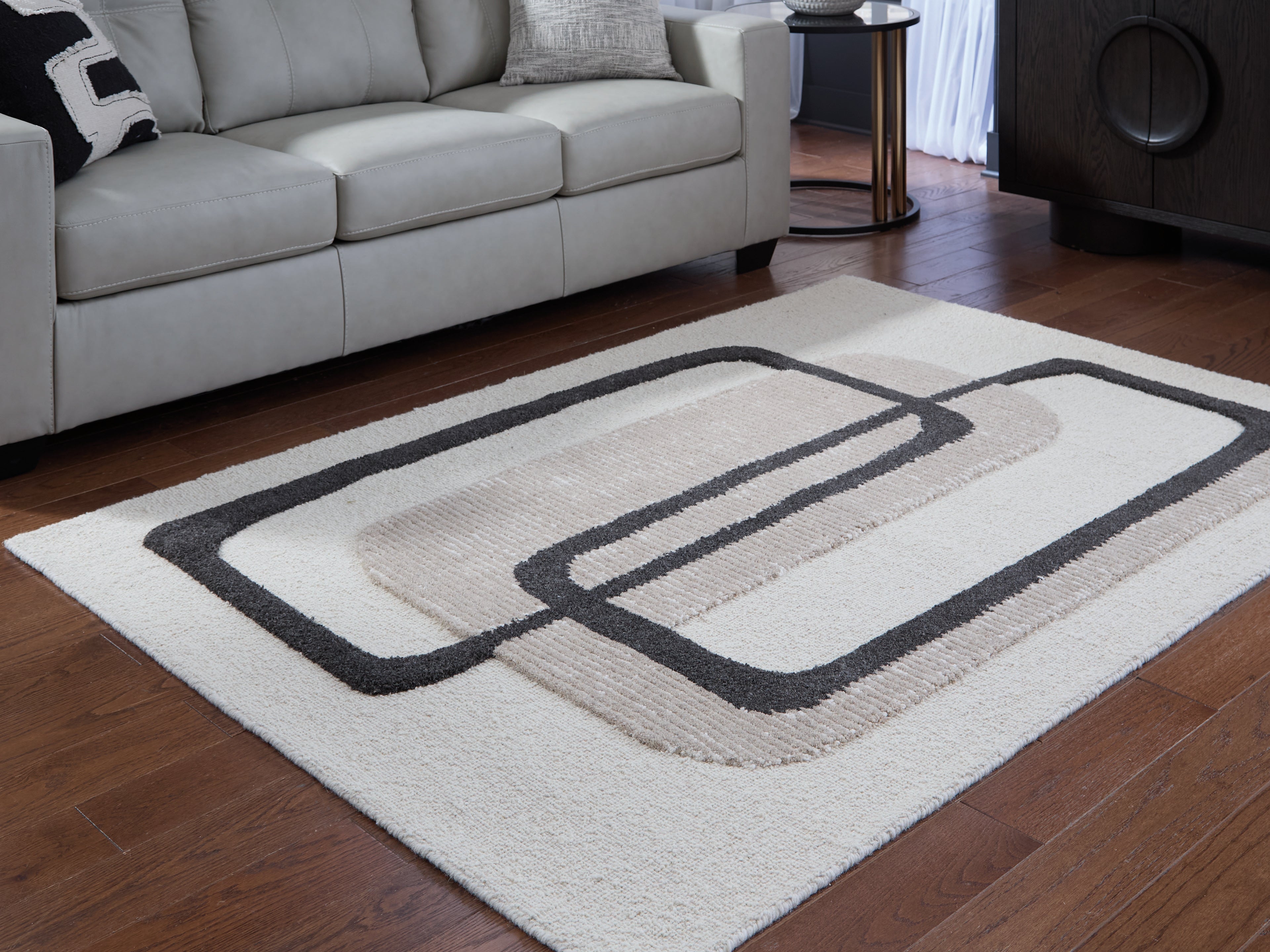 Bay Furniture Gallery - Ashley Furniture - Davismour Rug - 5' x 7' Area Rug / Ivory/Taupe/Charcoal - R407562