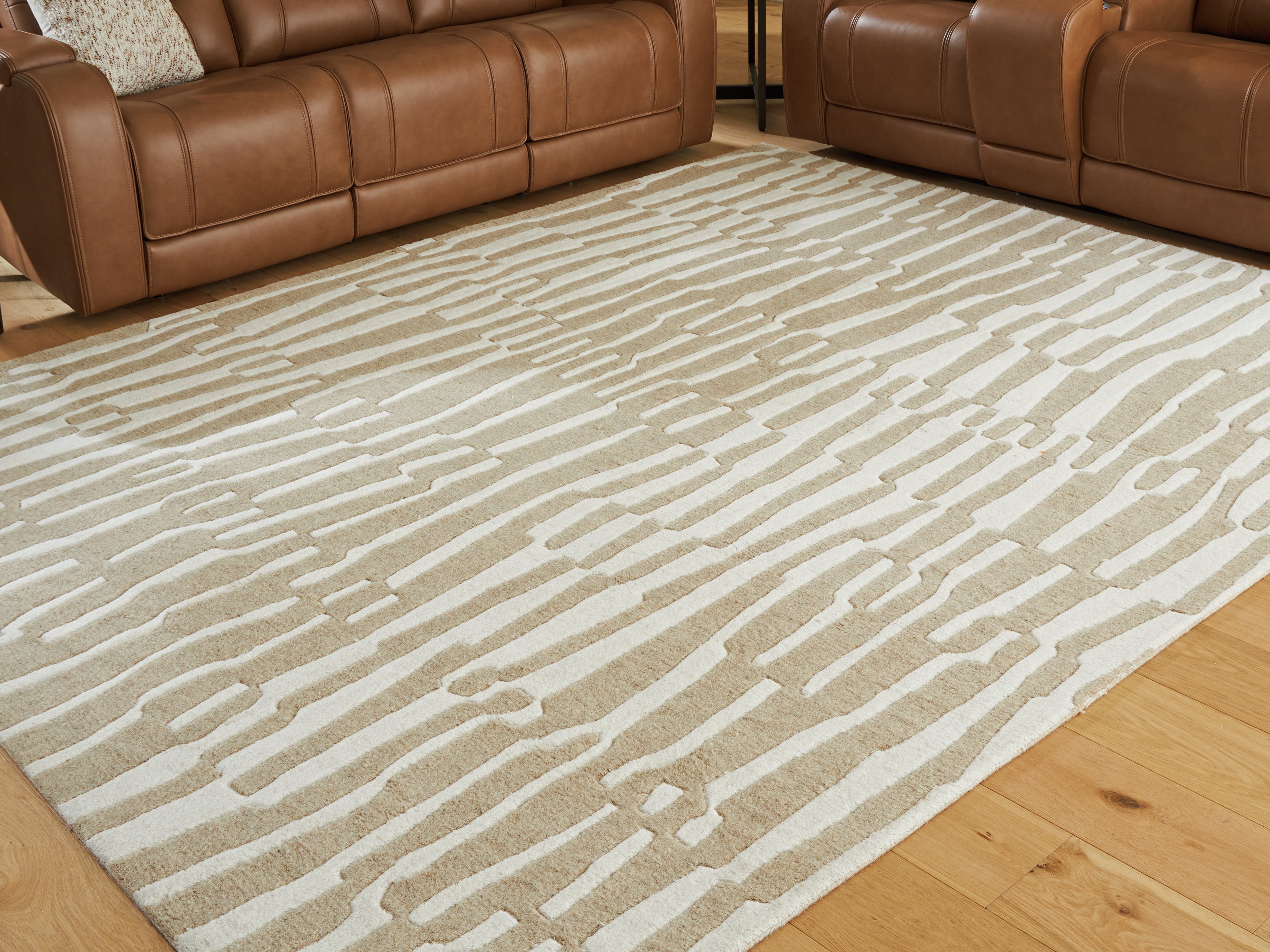 Bay Furniture Gallery - Ashley Furniture - Corrbell Rug - 5' x 7' Area Rug / Beige/White - R407632