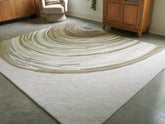 Bay Furniture Gallery - Ashley Furniture - Rizwana Rug - 5' x 7' Area Rug / Ivory/Brown/Gray - R407762