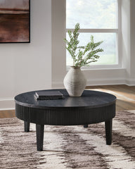 Bay Furniture Gallery - Ashley Furniture - Marstream Coffee Table - Round Cocktail Table / Black - T551-8