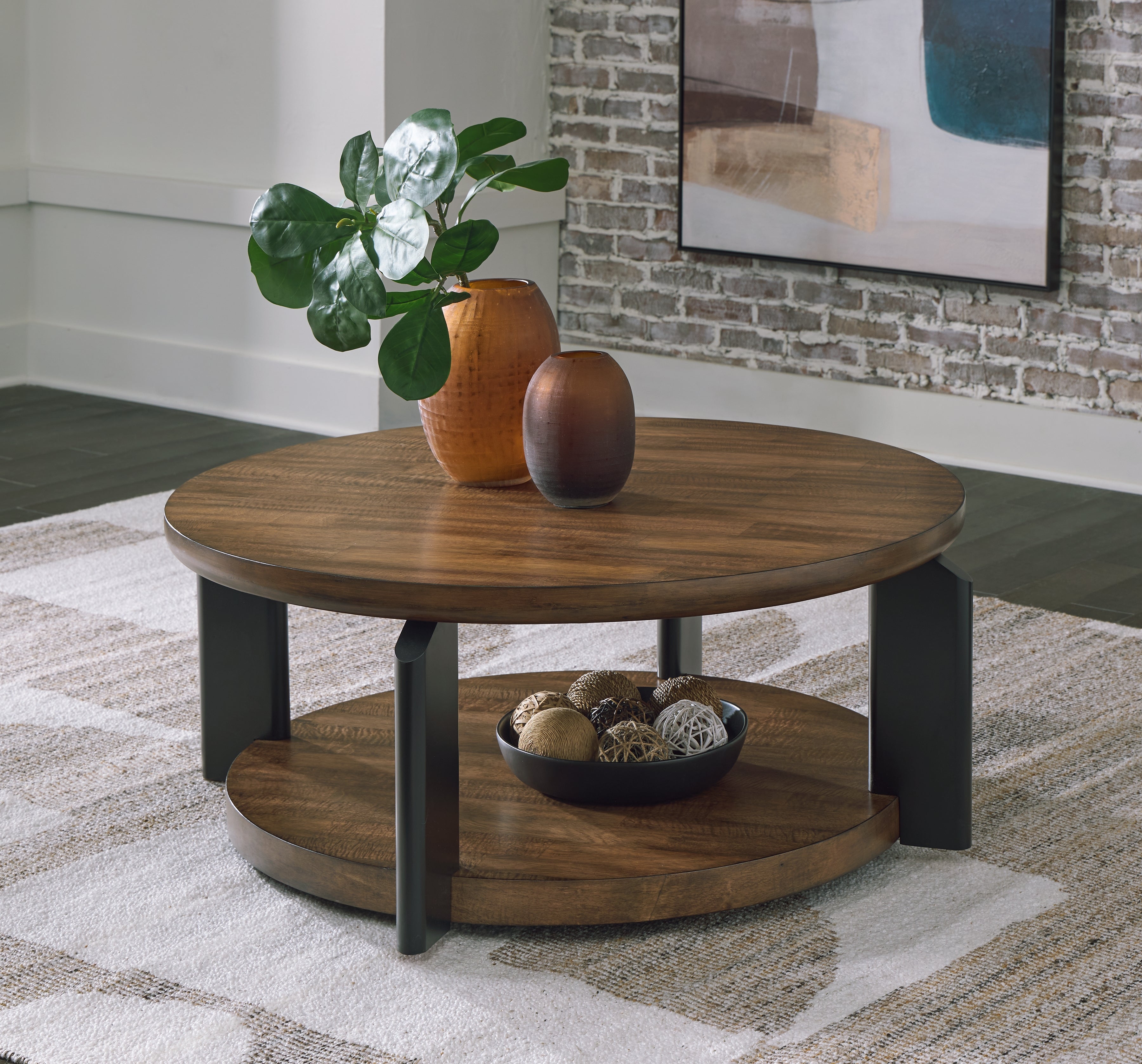 Bay Furniture Gallery - Ashley Furniture - Kraeburn Coffee Table - Round Cocktail Table / Brown/Black - T624-8