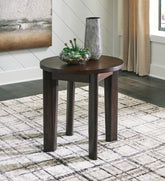 Bay Furniture Gallery - Ashley Furniture - Korestone 2 End Table - Round End Table / Dark Brown - T657-6